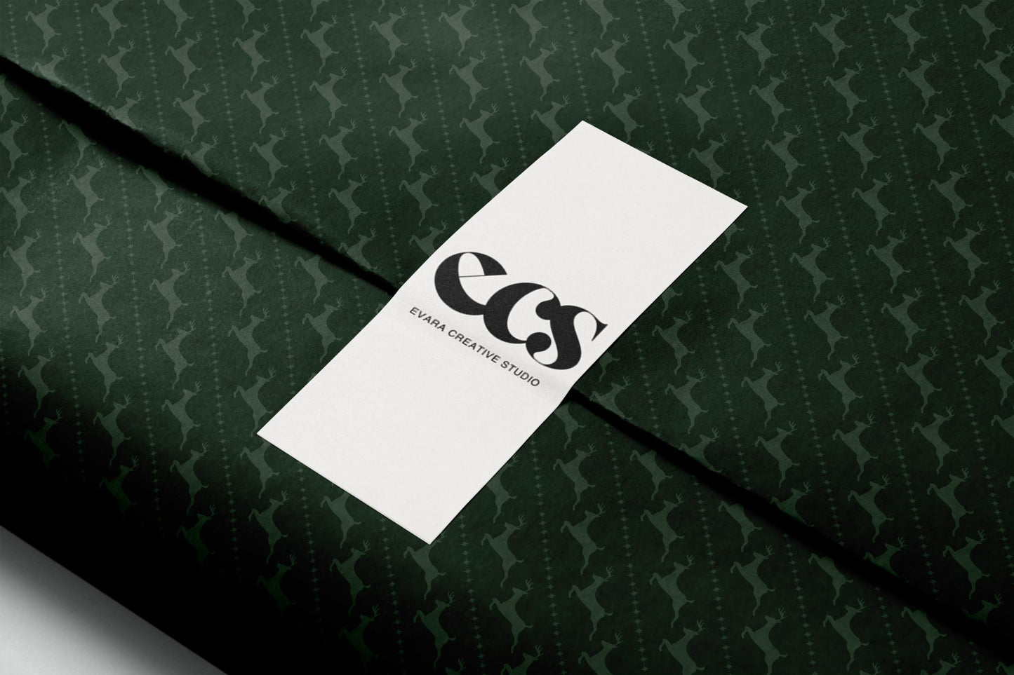 Green reindeer gift wrap — Evara Creative Studio